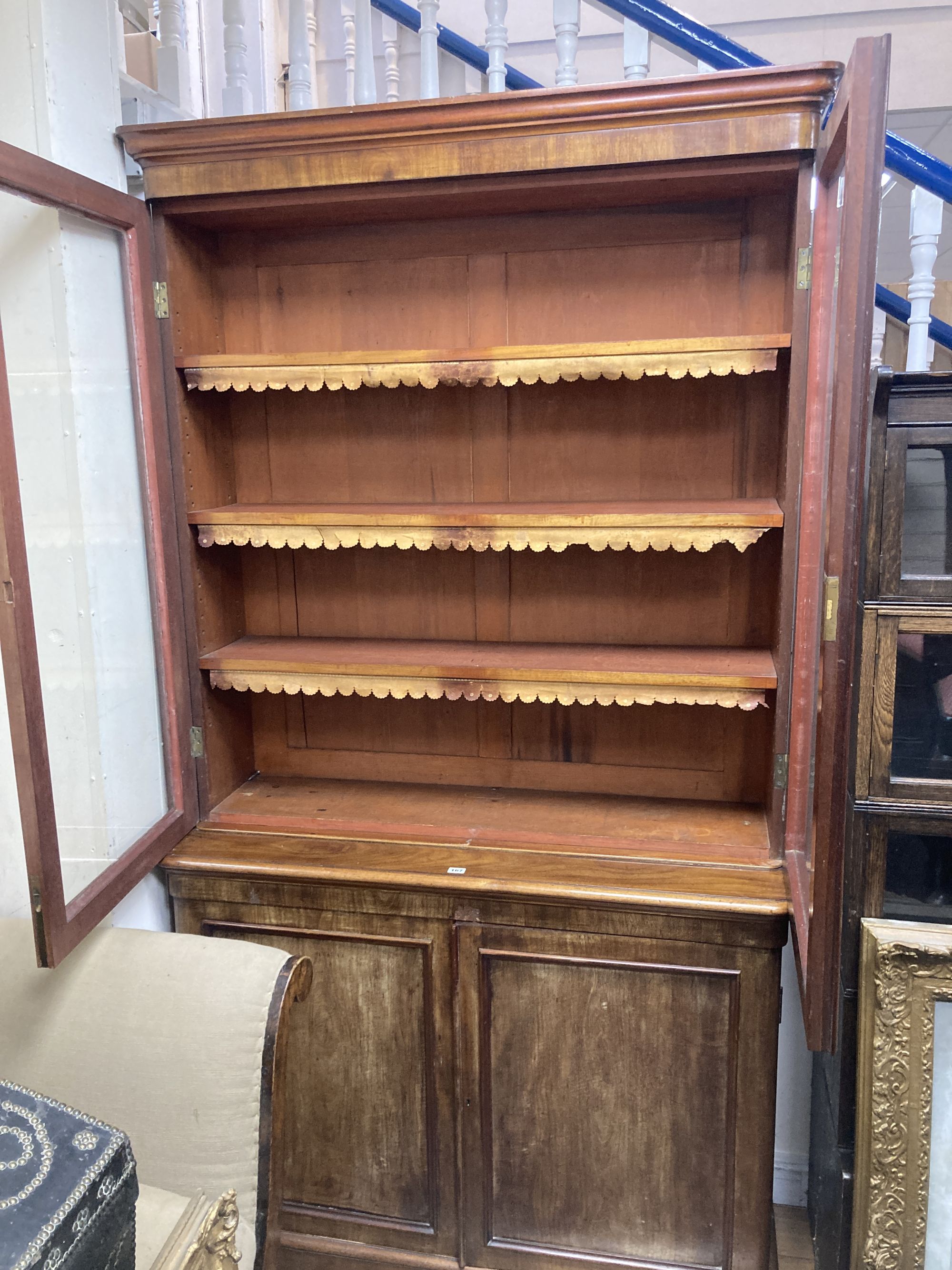 A Victorian mahogany glazed bookcase, width 122cm, depth 43cm, height 225cm